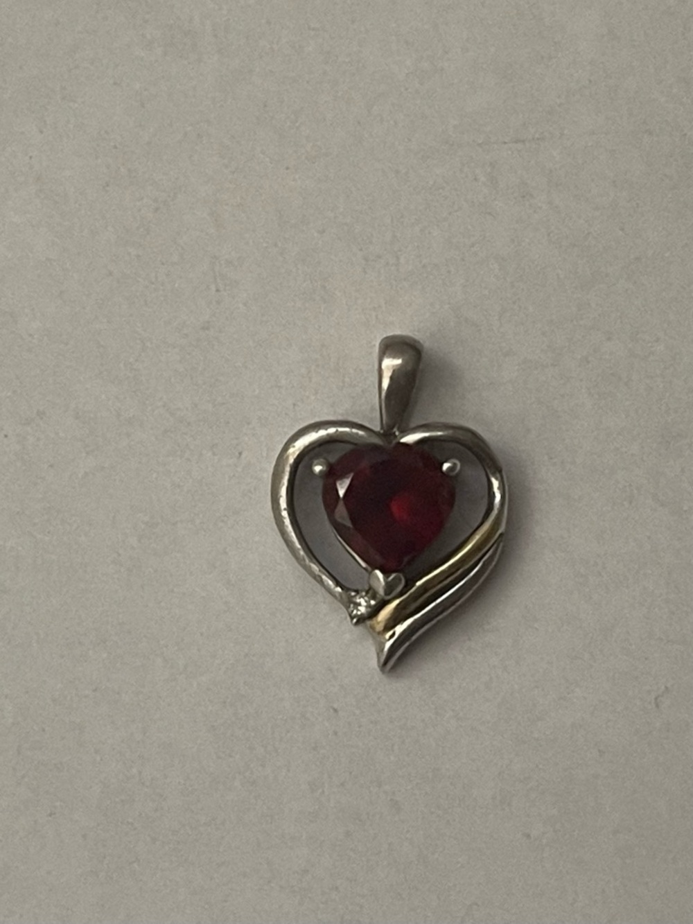 Heart-Shaped sterling silver 925, 14k gold pendant. Garnet, diamond accent